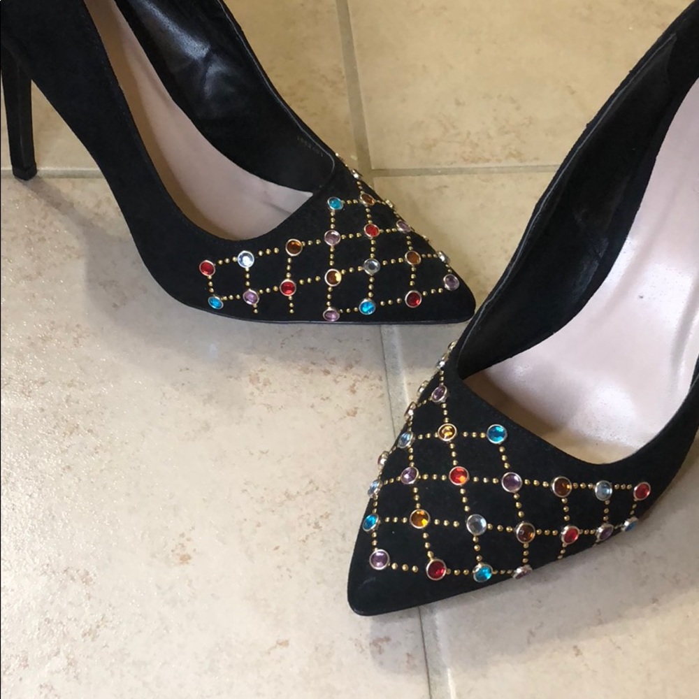 Black jeweled pumps